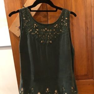 Suede-like peplum sleeveless tank.